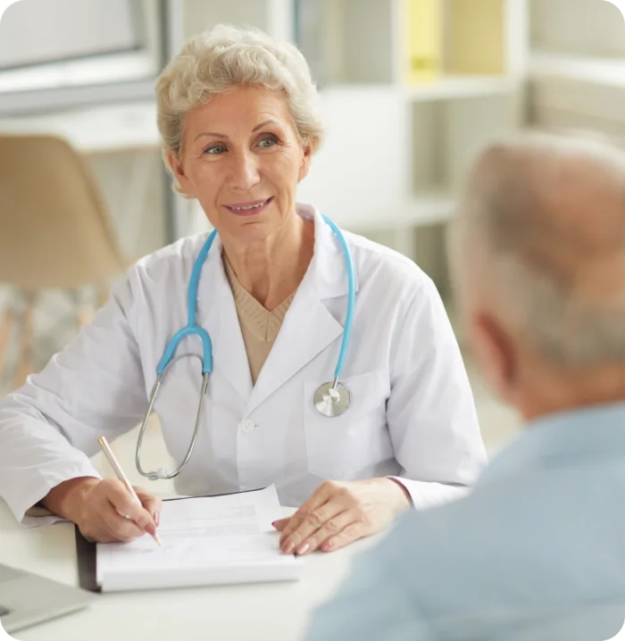 A clinician meeting with a patient