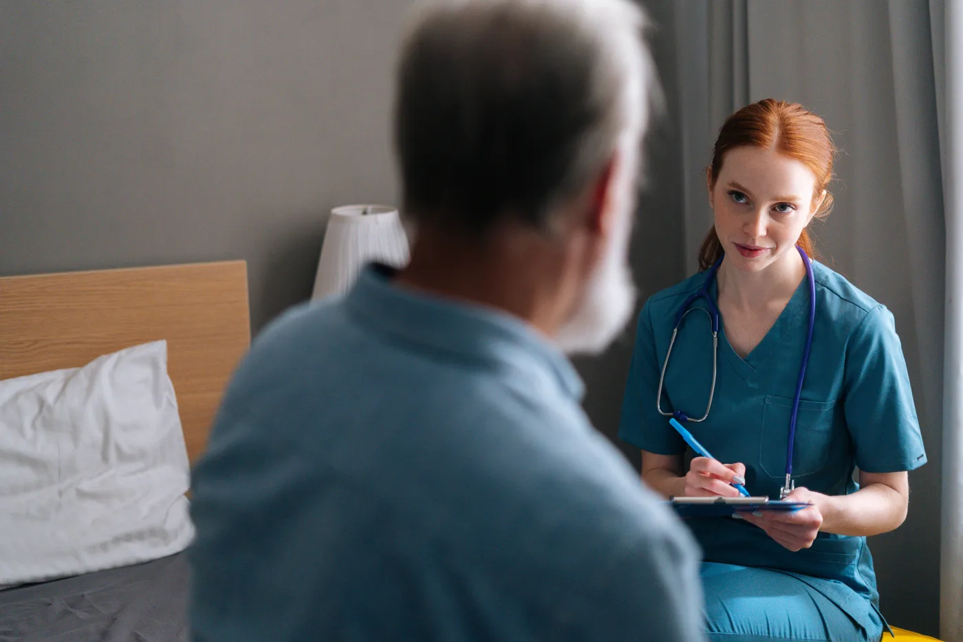 A patient talking with a clinician